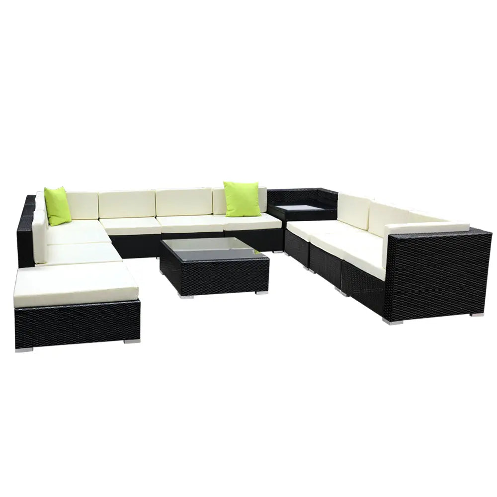 Gardeon 12PC Outdoor Furniture Set featuring wicker sofa lounge with cushions and a glass-top table, perfect for outdoor relaxation.