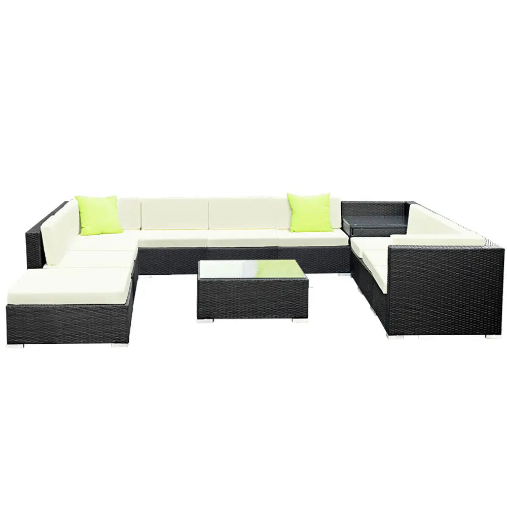 Gardeon 12PC Outdoor Furniture Set featuring wicker sofa lounge with cushions and a glass-top table, perfect for outdoor relaxation.