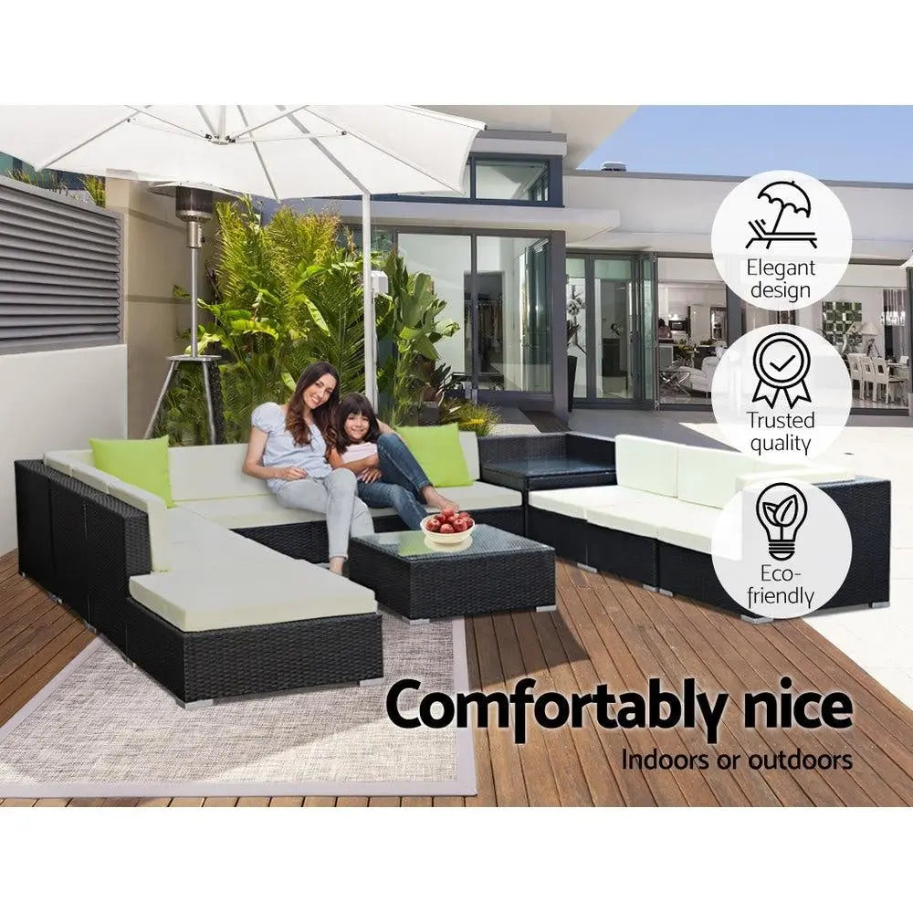 Gardeon 12PC Outdoor Furniture Set featuring wicker sofa lounge with cushions and a glass-top table, perfect for outdoor relaxation.