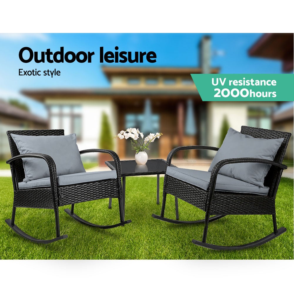 Gardeon 3 Piece Outdoor Chair Rocking Set in black featuring two rocking chairs and a tempered glass side table with cushions.