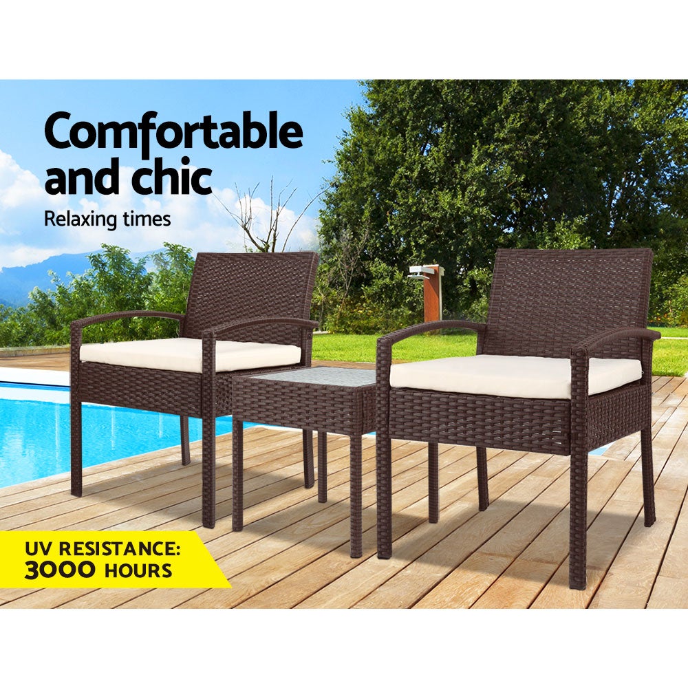 Gardeon 3-piece Outdoor Set featuring brown PE wicker chairs and a side table with a clear tempered glass top, complemented by beige cushions.