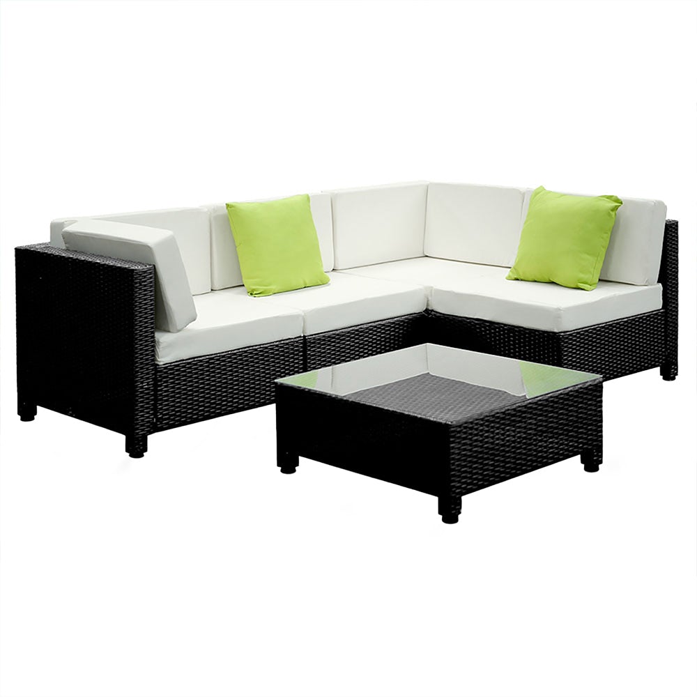 Gardeon 5PC Outdoor Furniture Sofa Set featuring modular wicker couches, a coffee table with tempered glass top, and vibrant cushions in a backyard setting.