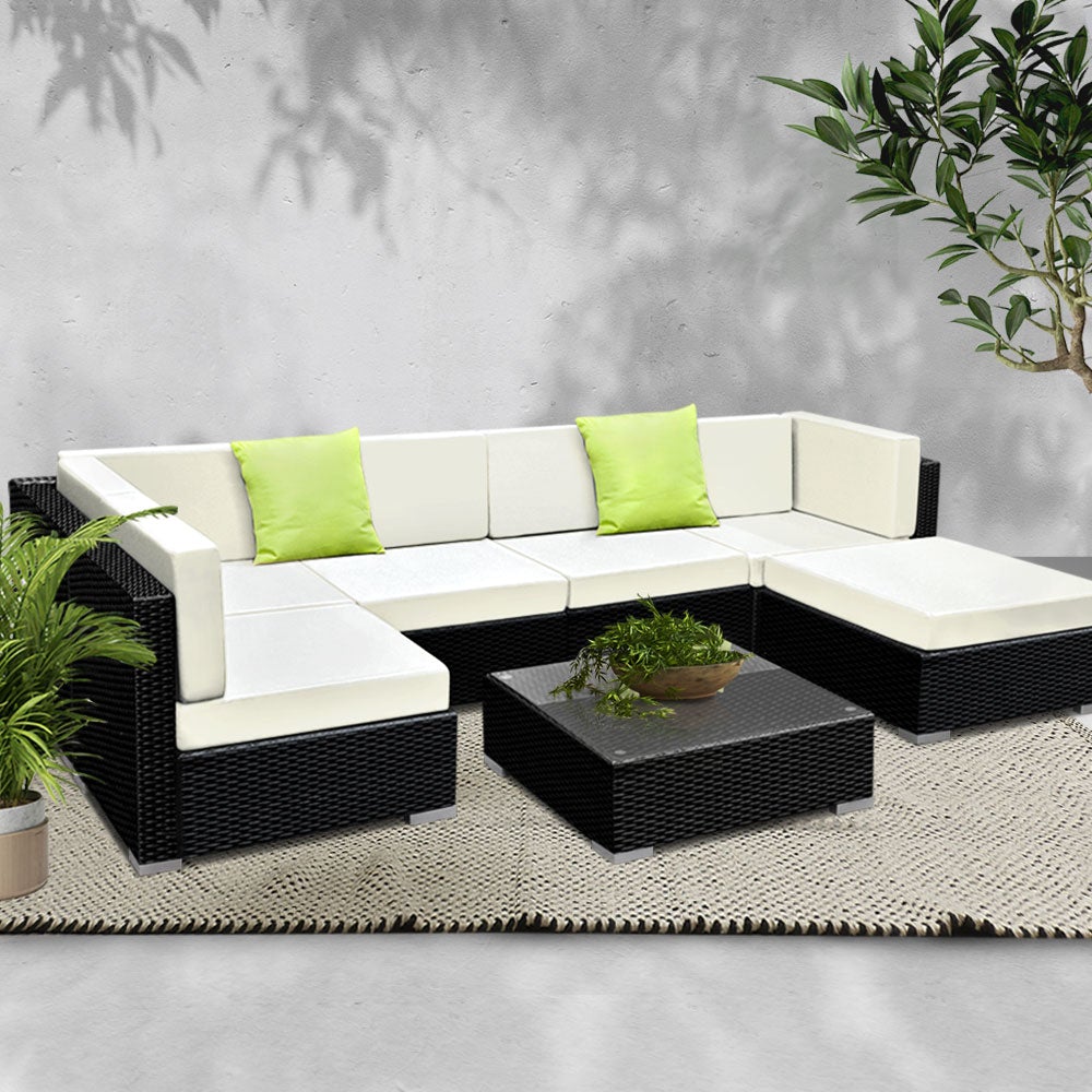 Gardeon 7PC Outdoor Furniture Sofa Set featuring black aluminium frame, beige cushions, and lime green throw pillows, perfect for garden or patio.