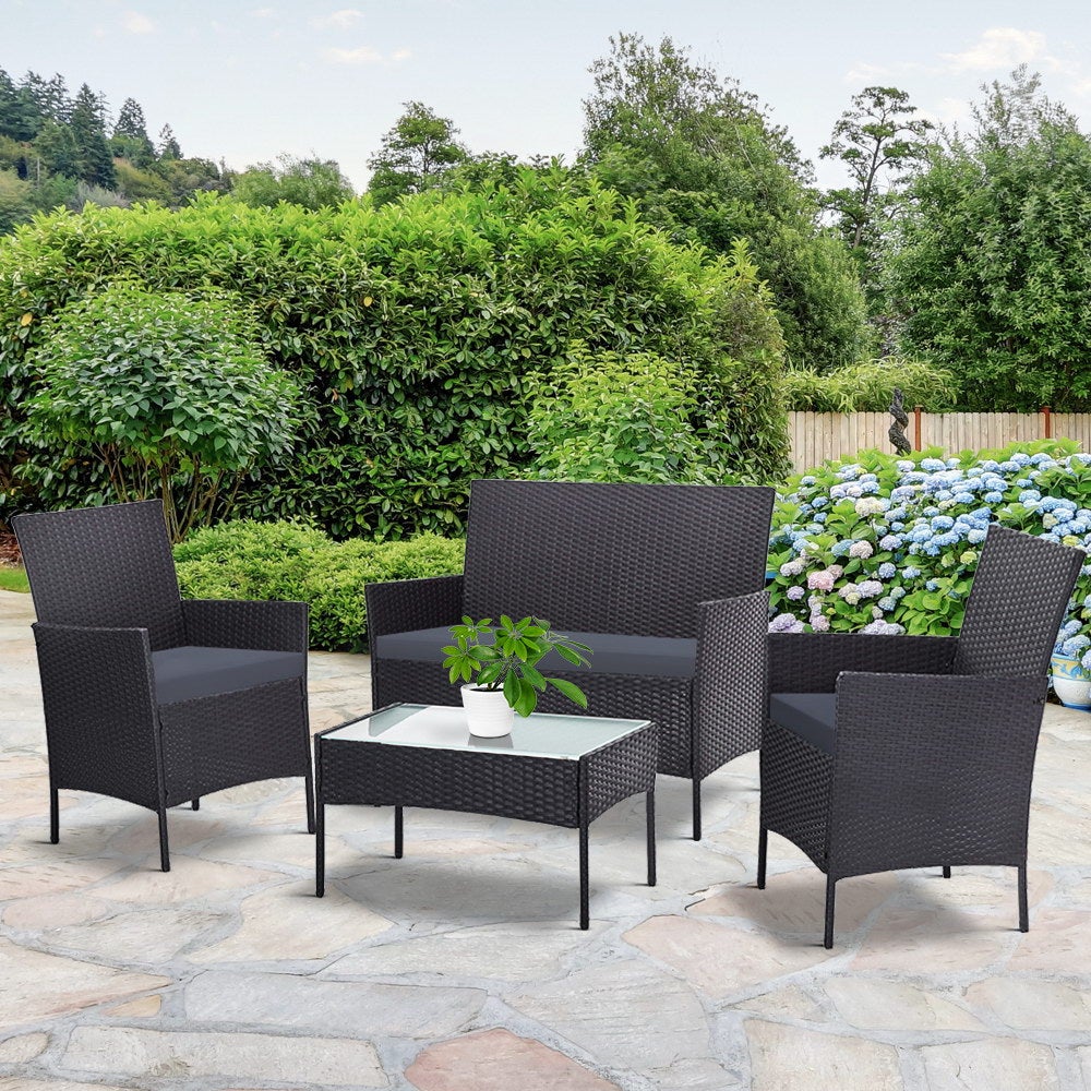 Gardeon Garden Furniture Outdoor Lounge Setting featuring two armchairs, a two-seater sofa, and a matching table in dark grey wicker design.