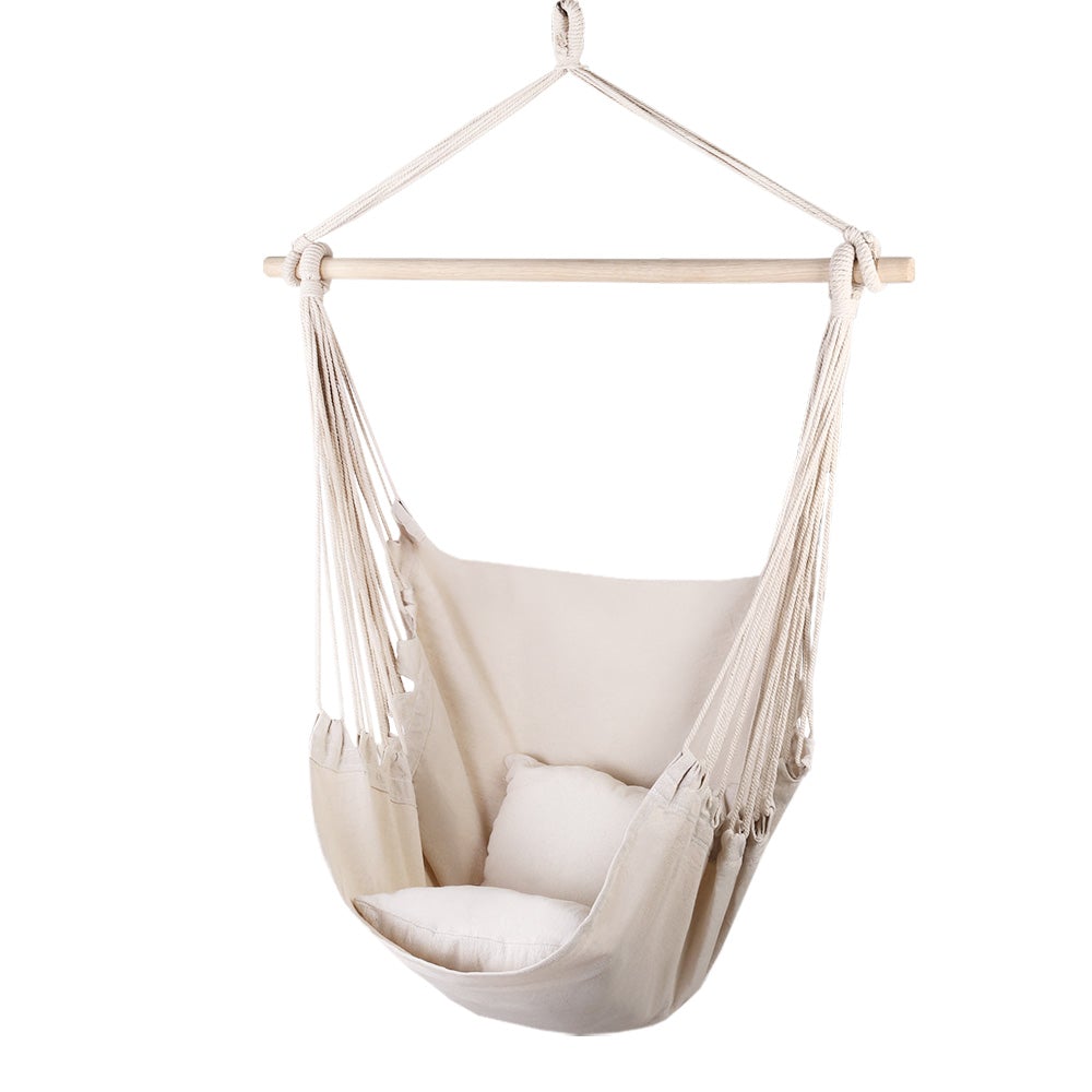 Gardeon Hammock Swing Chair in Cream color with matching cushions, hanging from a sturdy timber rail.