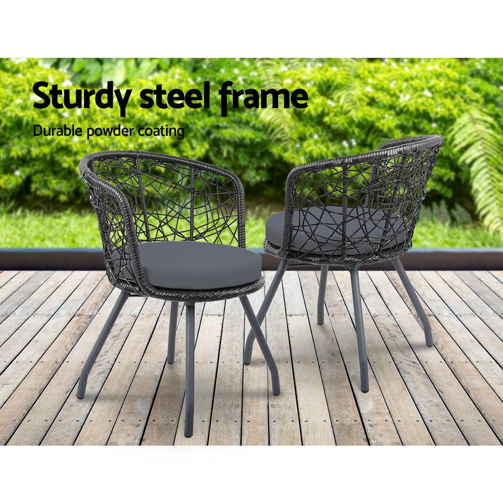 Gardeon Outdoor Patio Chair and Table set in black, featuring two rattan chairs with grey cushions and a matching side table with a glass top.