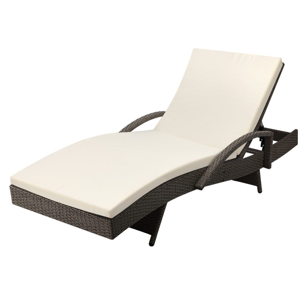 Gardeon Outdoor Sun Lounge in grey with beige cushions, featuring adjustable backrest and reversible armrests, set in a garden.