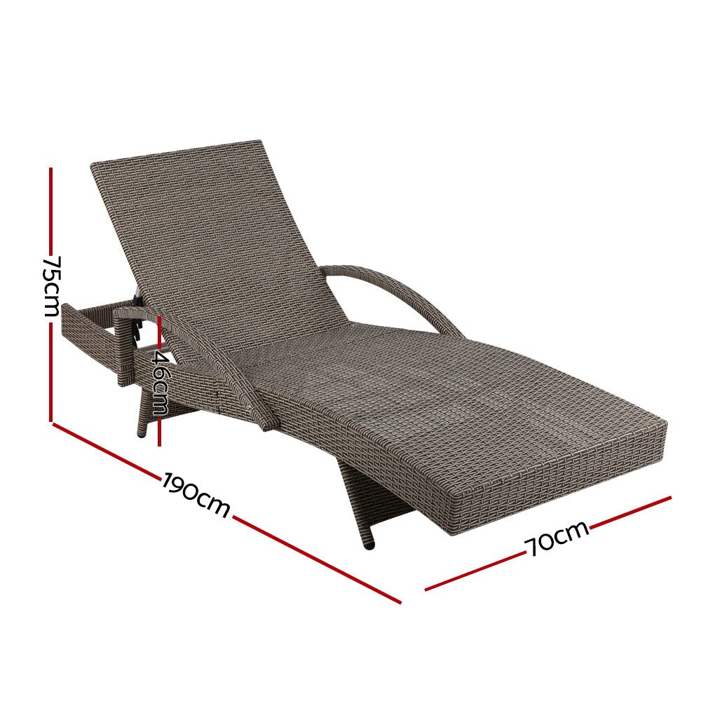 Gardeon Outdoor Sun Lounge in grey with beige cushions, featuring adjustable backrest and reversible armrests, set in a garden.