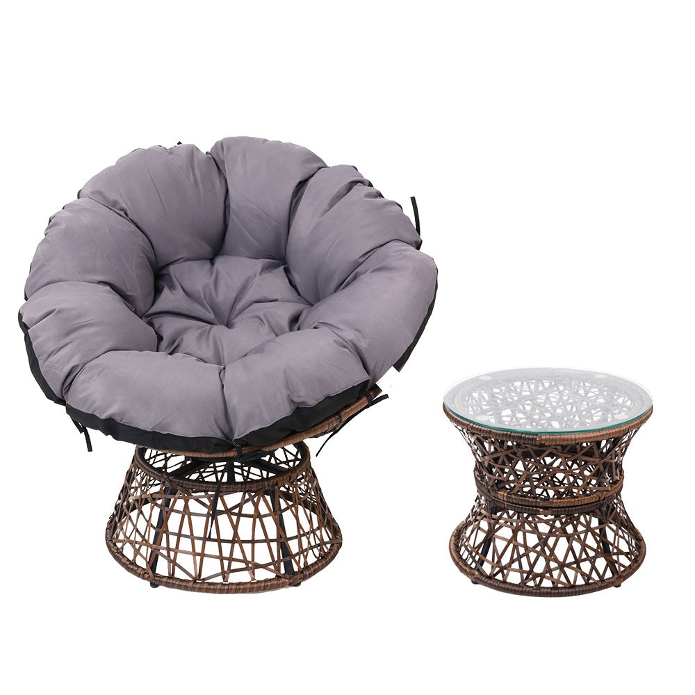 Gardeon Papasan Chair and Side Table set in brown, featuring a round wicker chair with thick padding and a matching side table with a glass top.