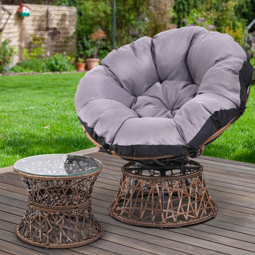 Gardeon Papasan Chair and Side Table set in brown, featuring a round wicker chair with thick padding and a matching side table with a glass top.