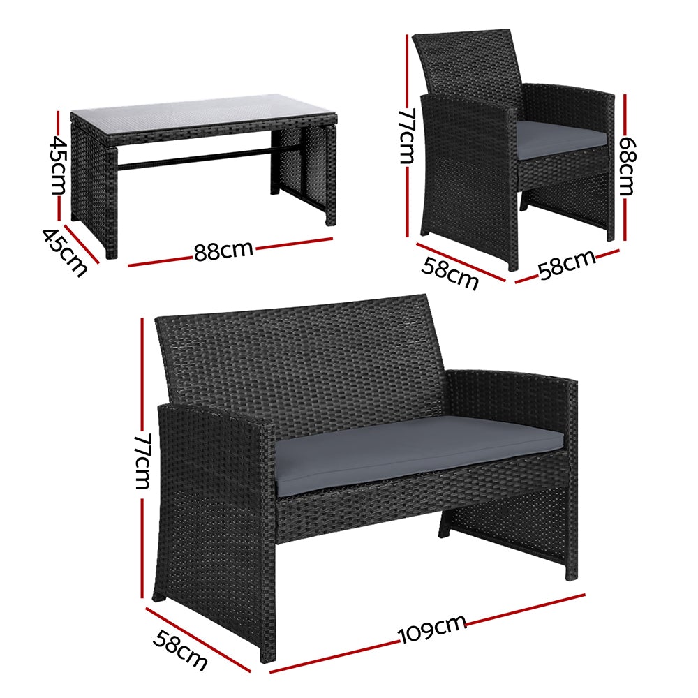 Gardeon Set of 4 Outdoor Wicker Chairs and Table in Black with grey cushions, showcasing a modern design suitable for outdoor and indoor use.