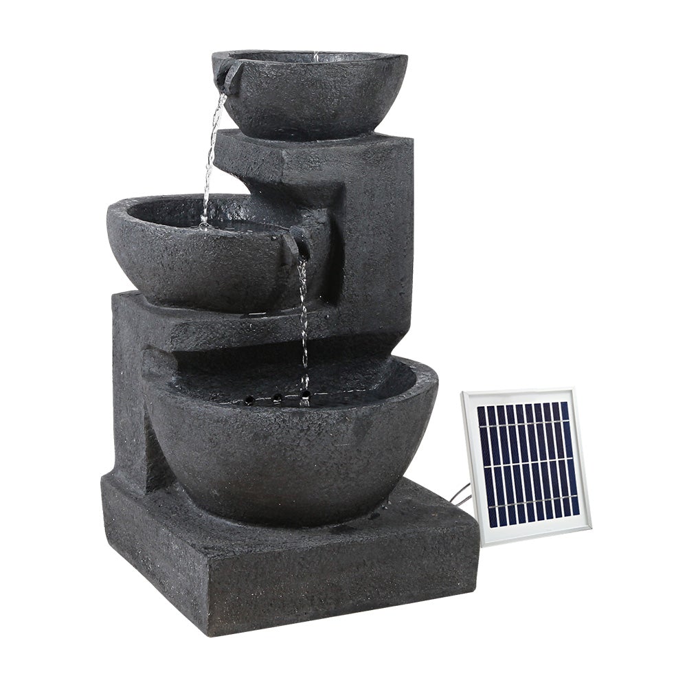 Gardeon Solar Fountain with LED lights, featuring a three-tier design and blue polyresin material, set in a garden environment.