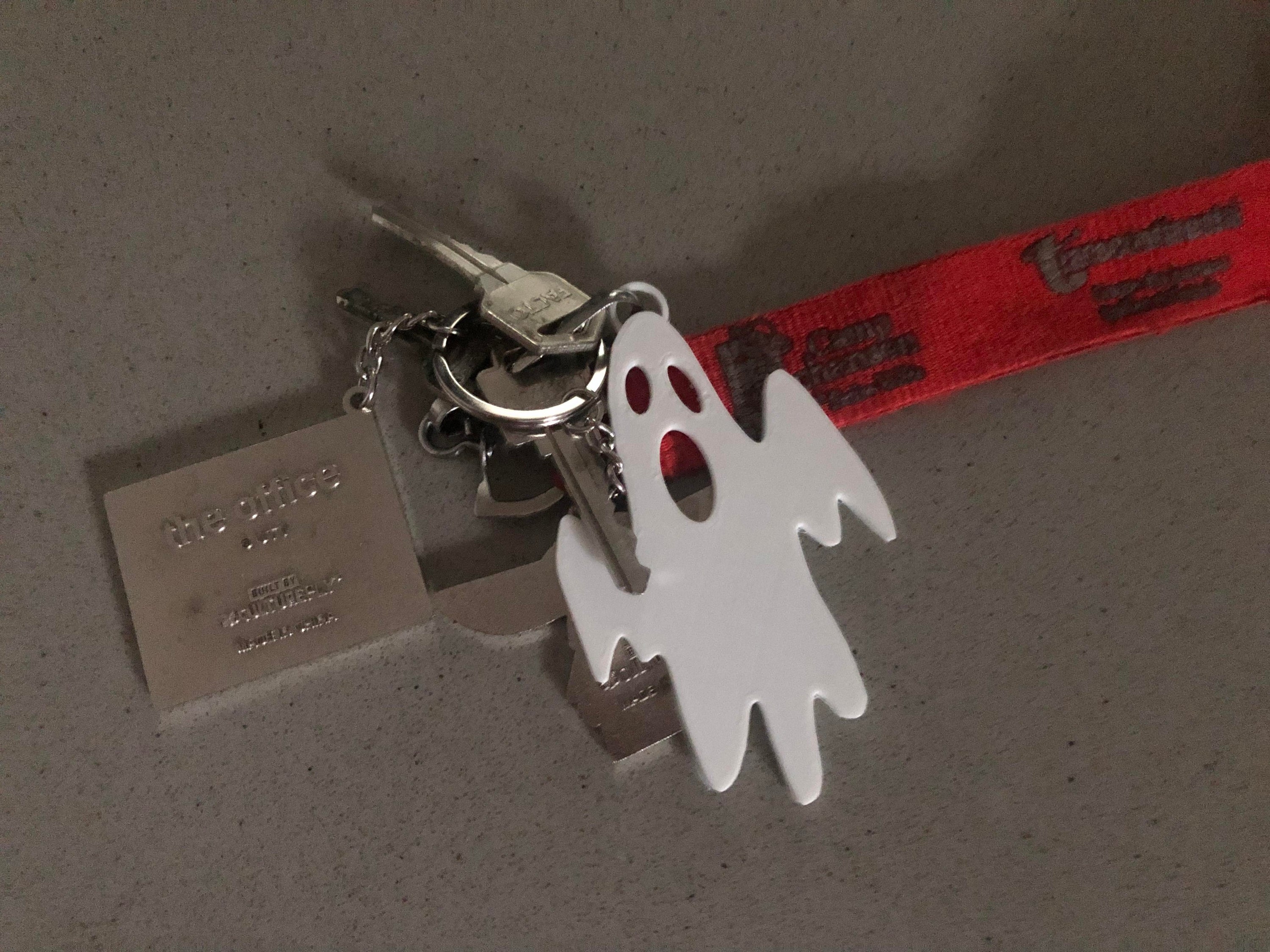 A collection of three unique ghost keychains in various styles, perfect for Halloween gifts and party favors.