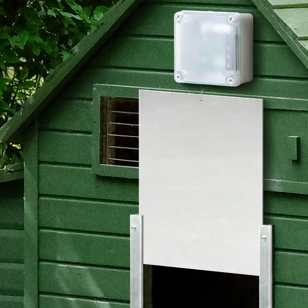 Giantz Automatic Chicken Coop Door Opener with aluminum door and weatherproof enclosure, showcasing its digital display and mounting screws.