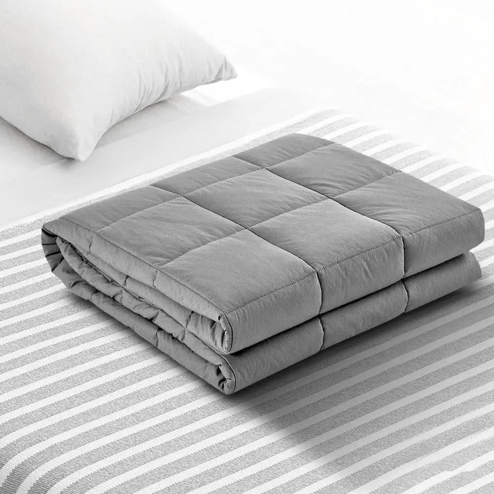 Giselle Bedding 7KG Microfibre Weighted Gravity Blanket in light grey, showcasing its soft texture and even weight distribution.