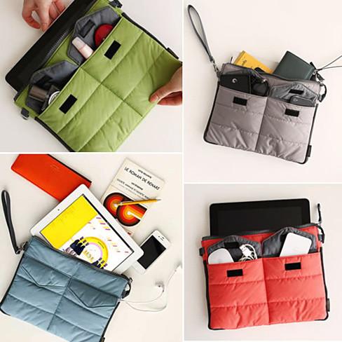 GO GO Gadget Pouch Insert in vibrant colors, showcasing its sturdy nylon material and multiple compartments for organization.