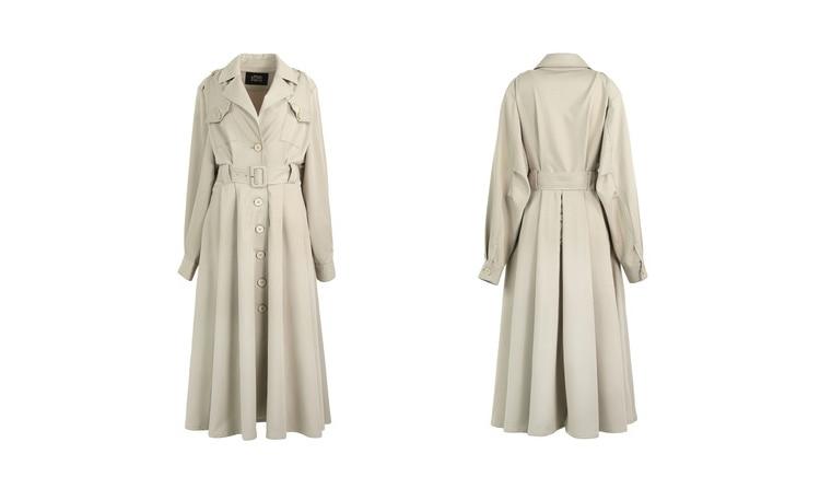 A stylish green oversize trench coat for women, featuring a single-breasted closure and full sleeves, perfect for spring and autumn wear.