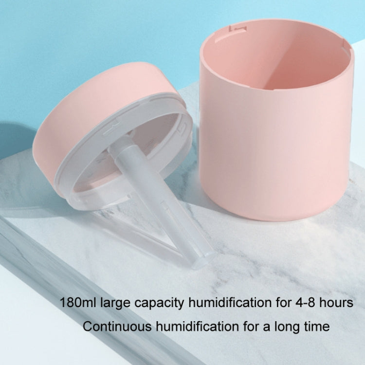 H6 Desktop USB Colorful Air Humidifier in Pink with ambient light, showcasing its sleek design and compact size.