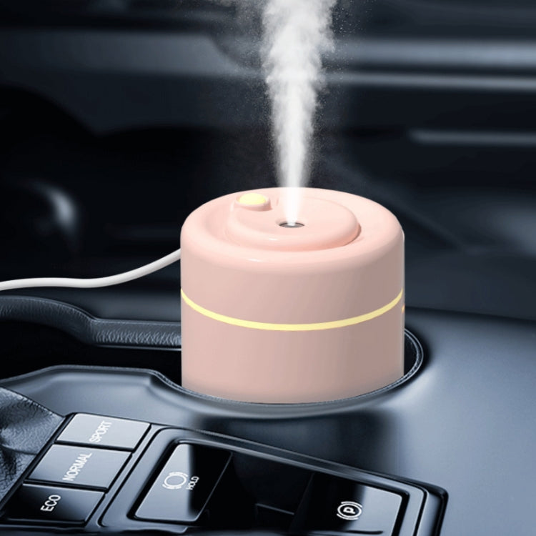 H6 Desktop USB Colorful Air Humidifier in Pink with ambient light, showcasing its sleek design and compact size.