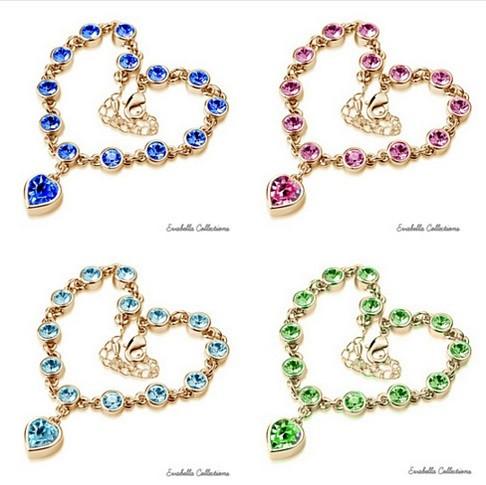 Happy Hearts Swarovski Crystal Bracelets featuring colorful heart charms and clear crystals, available in silver polished and gold plated finishes.