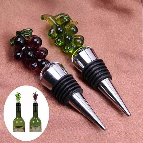 Hearty Wines Pair of Wine Stoppers featuring hand-made glass grapes and crystal hearts, perfect for wine lovers.