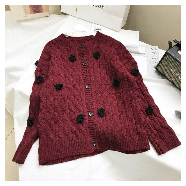 High quality women's winter cardigan sweater featuring embroidered floral design, perfect for festive occasions and cold weather.