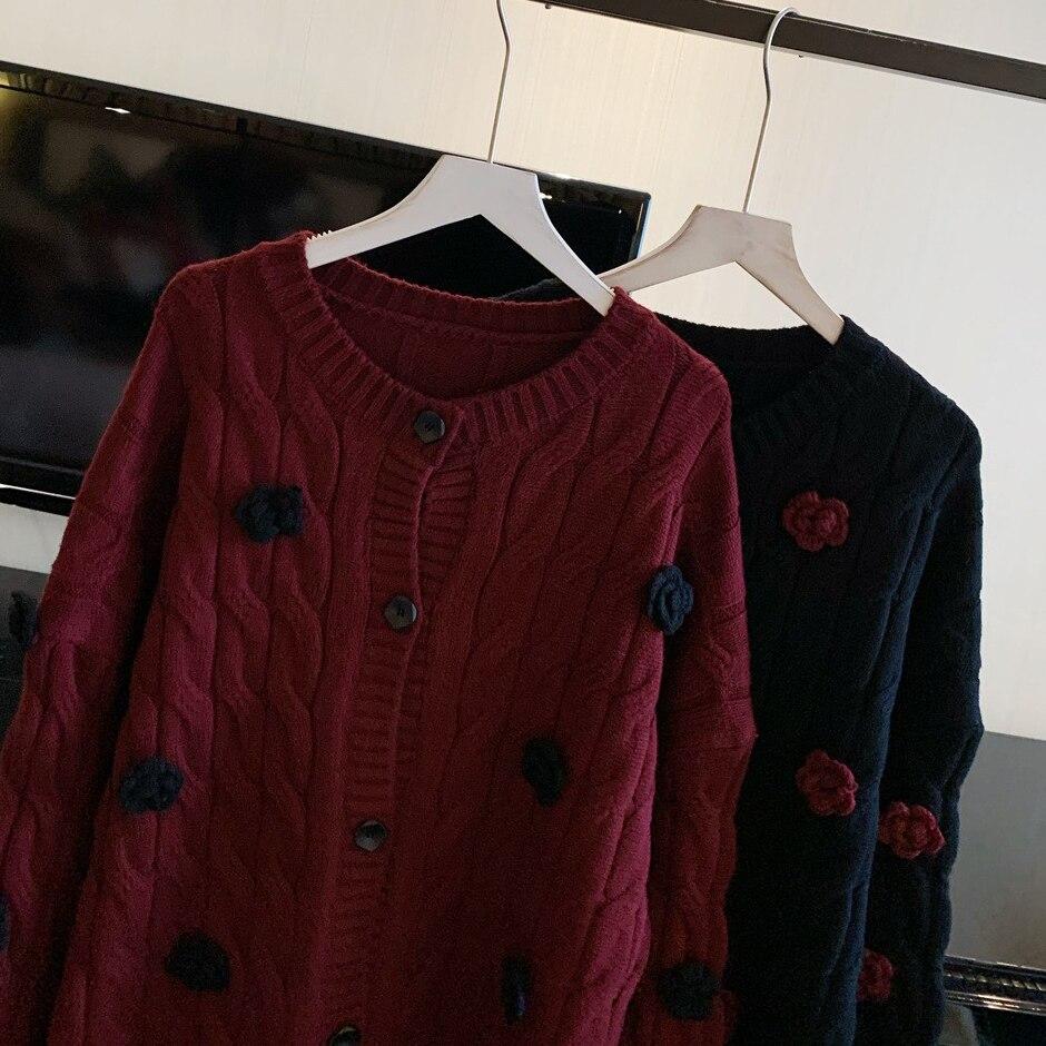 High quality women's winter cardigan sweater featuring embroidered floral design, perfect for festive occasions and cold weather.