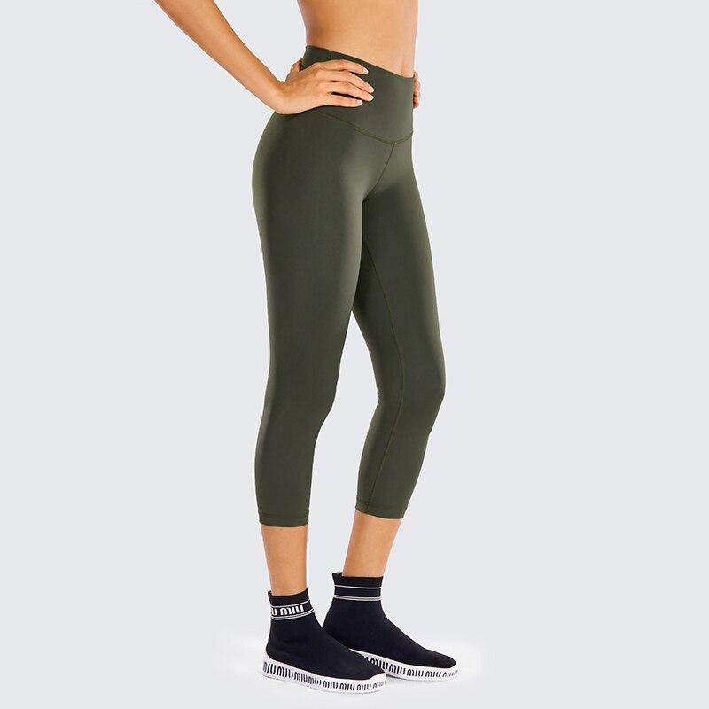 High Waisted Capri Workout Leggings for Women in black, featuring a snug fit and elastic waist, perfect for athletic activities.