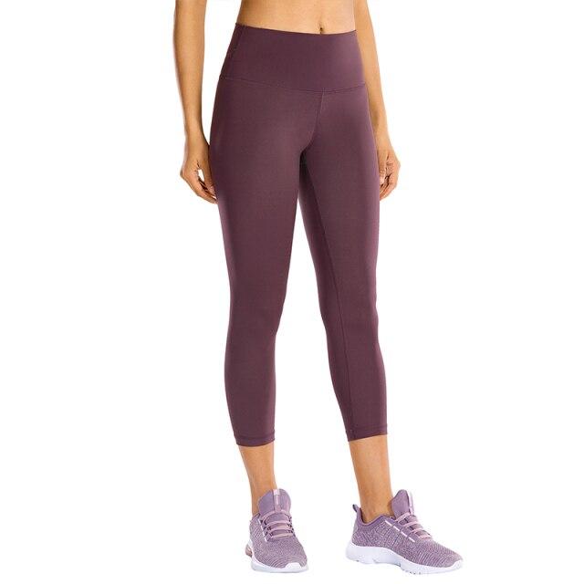 High Waisted Capri Workout Leggings for Women in black, featuring a snug fit and elastic waist, perfect for athletic activities.