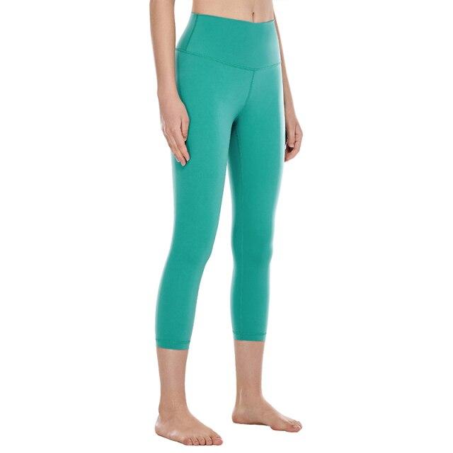 High Waisted Capri Workout Leggings for Women in black, featuring a snug fit and elastic waist, perfect for athletic activities.