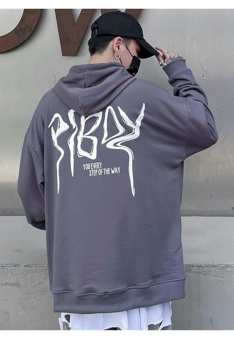 A stylish black hoodie featuring a vibrant graffiti print, designed for men and youth, perfect for high street fashion.