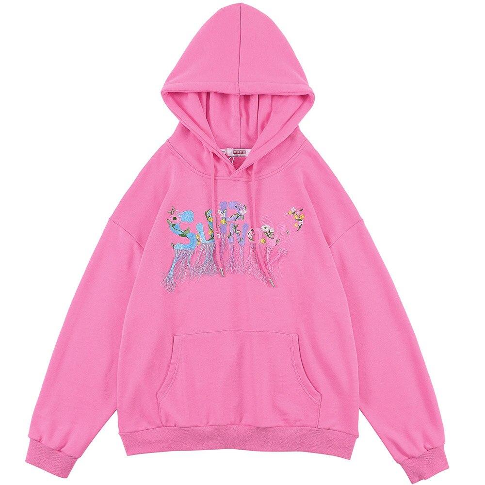 Men's hoodie featuring flower embroidery and tassels, perfect for autumn casual wear.