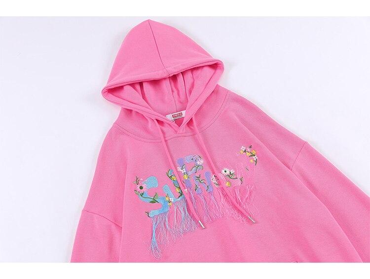 Men's hoodie featuring flower embroidery and tassels, perfect for autumn casual wear.