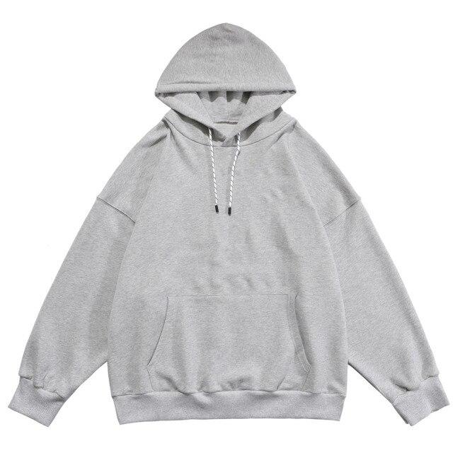 Men's hoodie featuring hit color design and letter patch, perfect for casual streetwear.