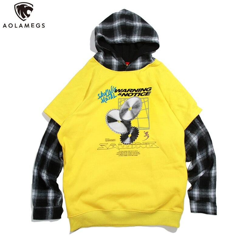 Men's oversized hooded pullover featuring plaid print sleeves in black and yellow, perfect for streetwear style.