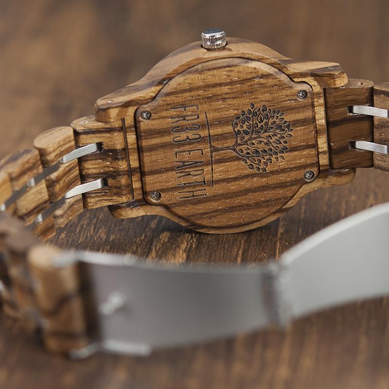 Ice Watch featuring a metallic face and wooden band, showcasing unique craftsmanship and natural materials.