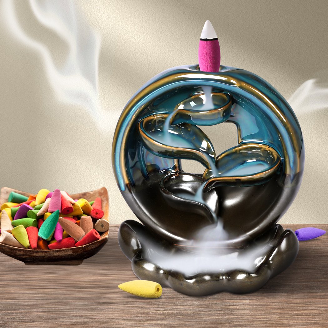 Ceramic incense burner with waterfall smoke effect, featuring a smooth blue finish and 10 natural incense cones.