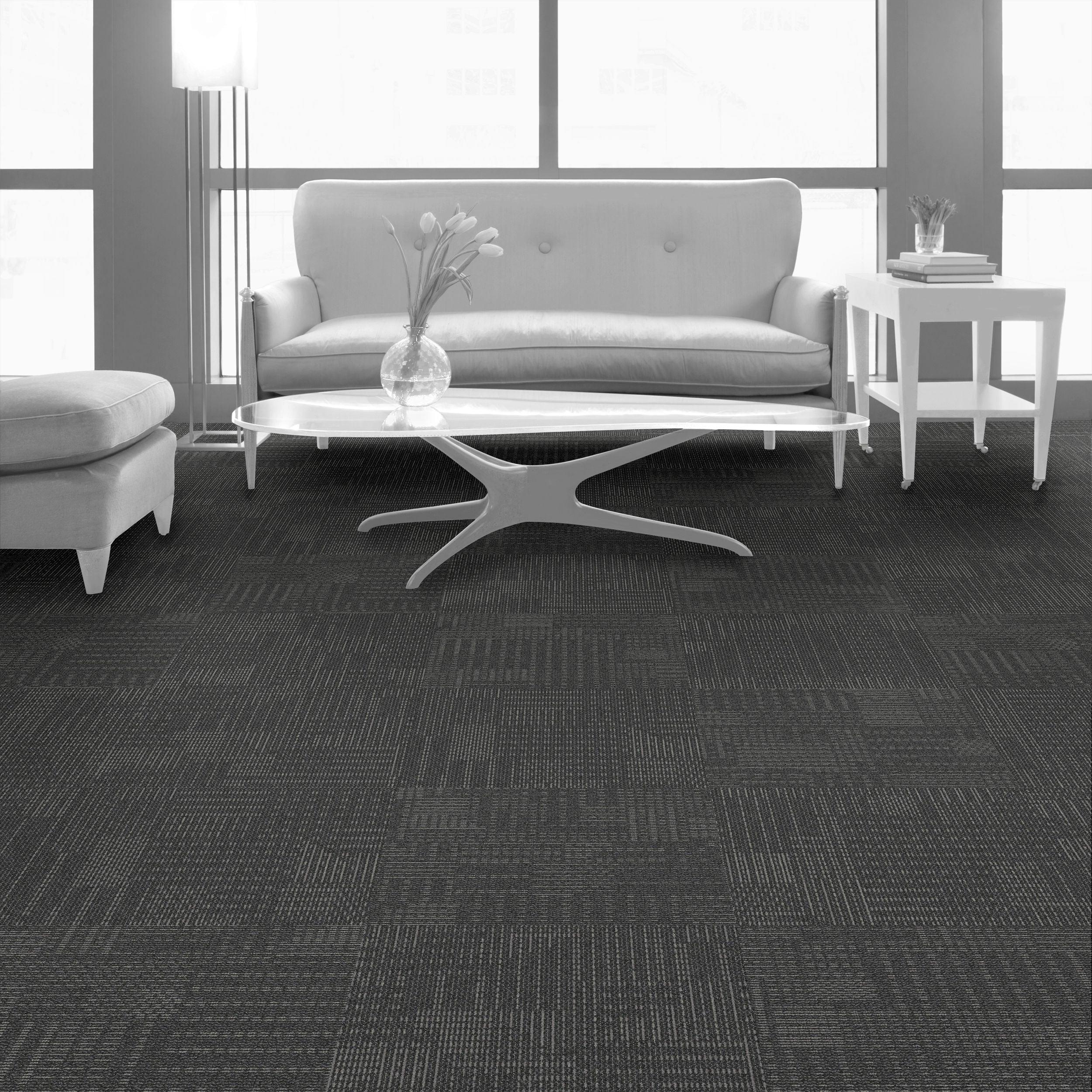 Interface CT101 Onyx carpet tiles featuring a unique dot and dash pattern, ideal for creative flooring designs.