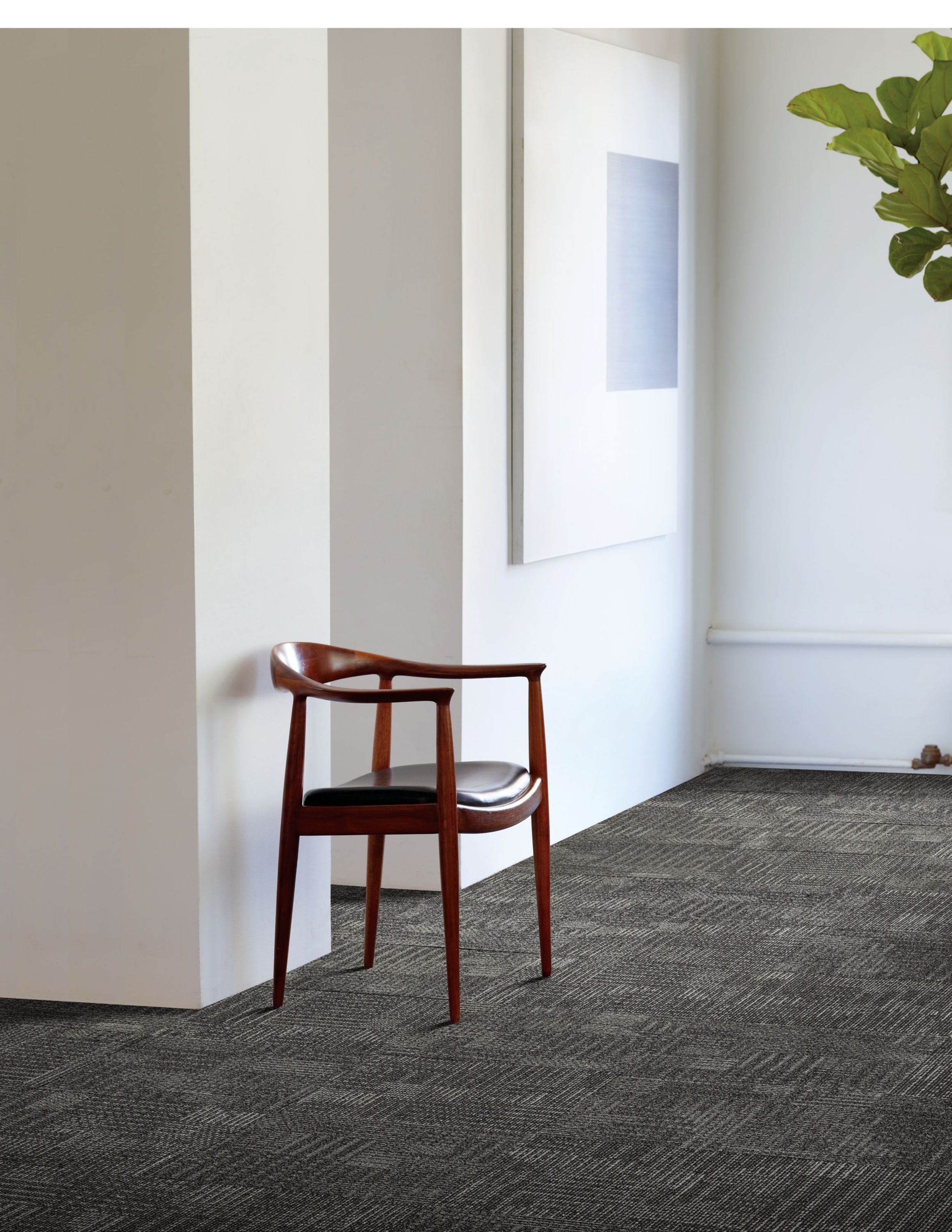 Interface CT101 Onyx carpet tiles featuring a unique dot and dash pattern, ideal for creative flooring designs.