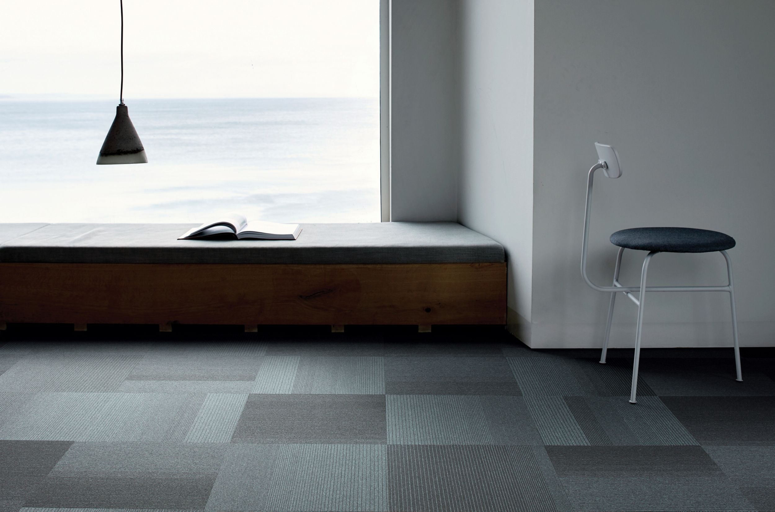 Interface Straightforward Steel carpet tiles in a modern setting, showcasing their linear design and eco-friendly features.