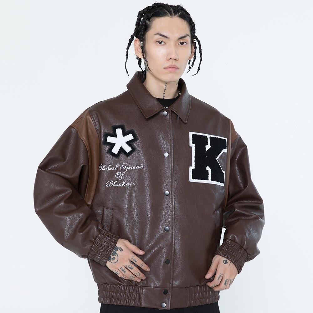 Men's retro baggy leather jacket featuring letter embroidery and patch designs, perfect for autumn streetwear.