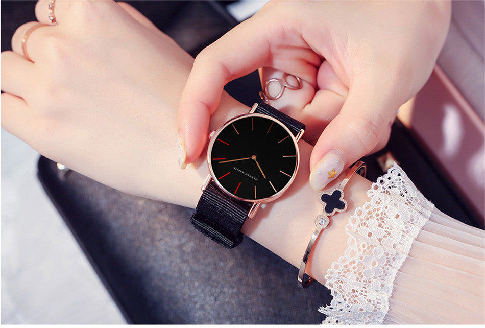 Japan Quartz Movement Men Waterproof Wrist Watch with nylon band and alloy case, showcasing a sleek ultra-thin design.