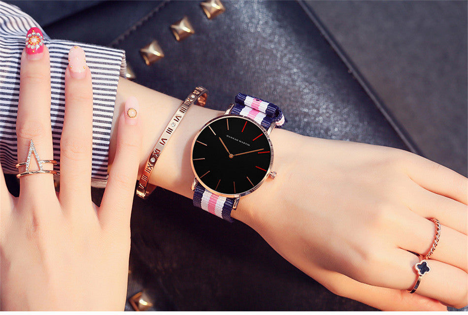 Japan Quartz Movement Men Waterproof Wrist Watch with nylon band and alloy case, showcasing a sleek ultra-thin design.