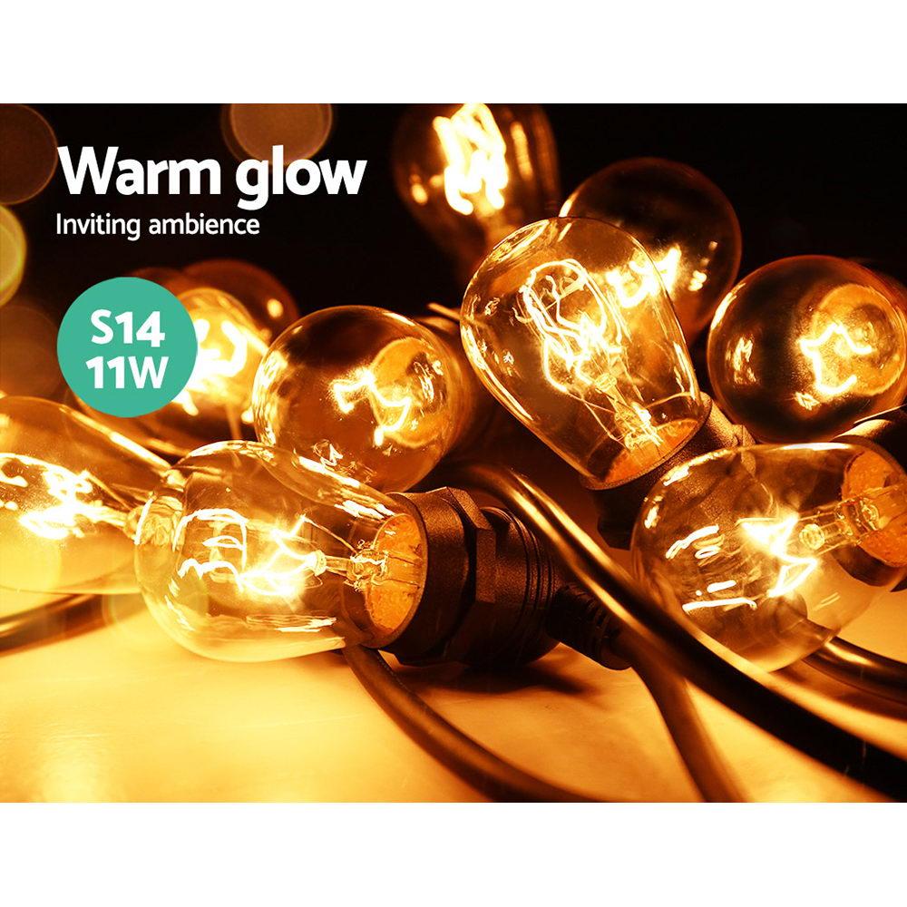 Jingle Jollys 47m Festoon String Lights with warm glowing bulbs, perfect for outdoor and indoor celebrations.