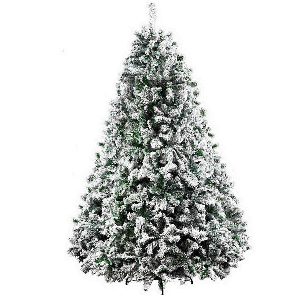 Jingle Jollys 2.1M Christmas Tree with snow-sprayed tips, standing tall in a festive living room setting, adorned with colorful ornaments.