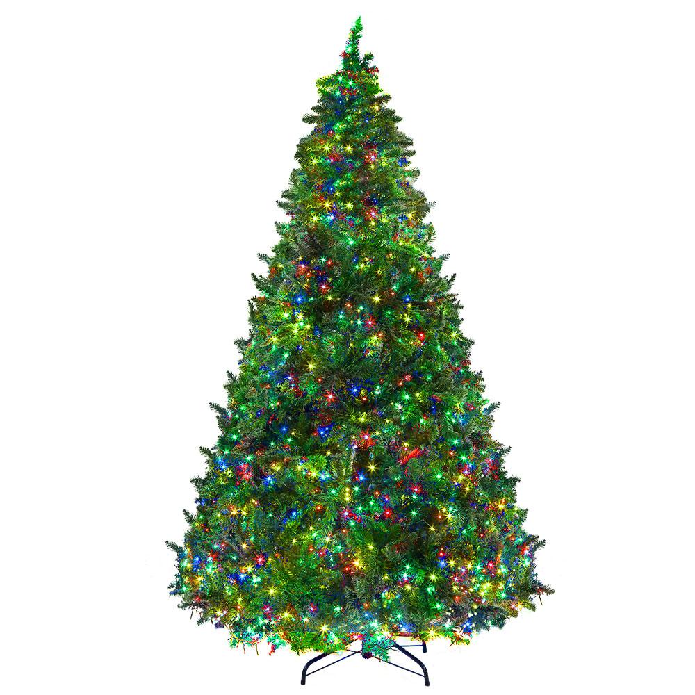 Jingle Jollys 2.4M LED Christmas Tree with multicoloured lights and bushy branches, set up for festive decorations.