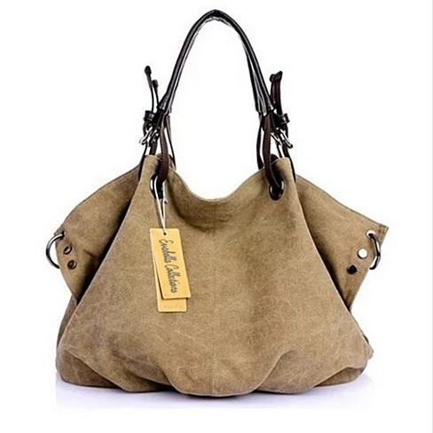 Stylish Journey Canvas Handbag in multiple colors with adjustable strap and organized pockets.