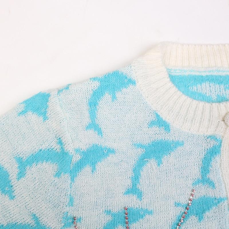 Women's autumn winter dolphin jacquard knitted sweater featuring a loose fit and playful cartoon design, perfect for casual streetwear.