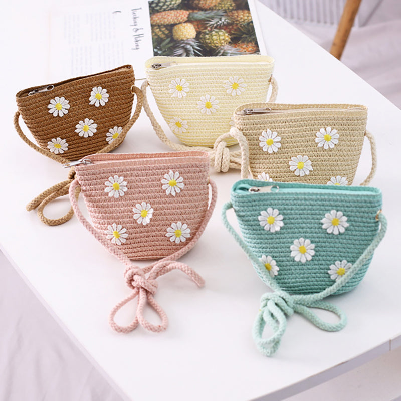 Kid Girl Daisy Flower Decor Straw Crossbody Bag in white, green, pink, beige, and khaki colors with a floral design.