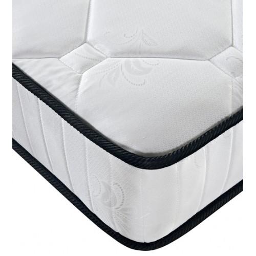 King Size Mattress featuring 6 turn pocket coil springs and soft foam, elegantly designed for comfort and support.